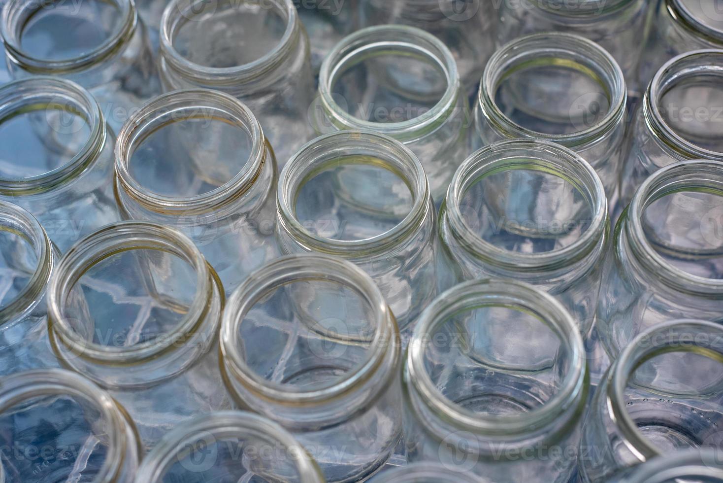 Sorting and collection of glass containers for recycling and reuse. photo