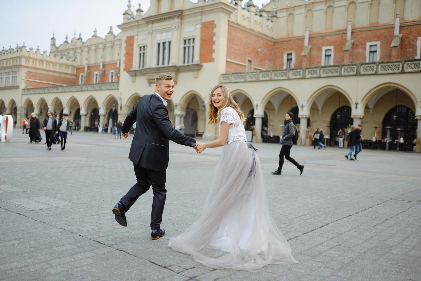 Two lovers walk along Krakow photo