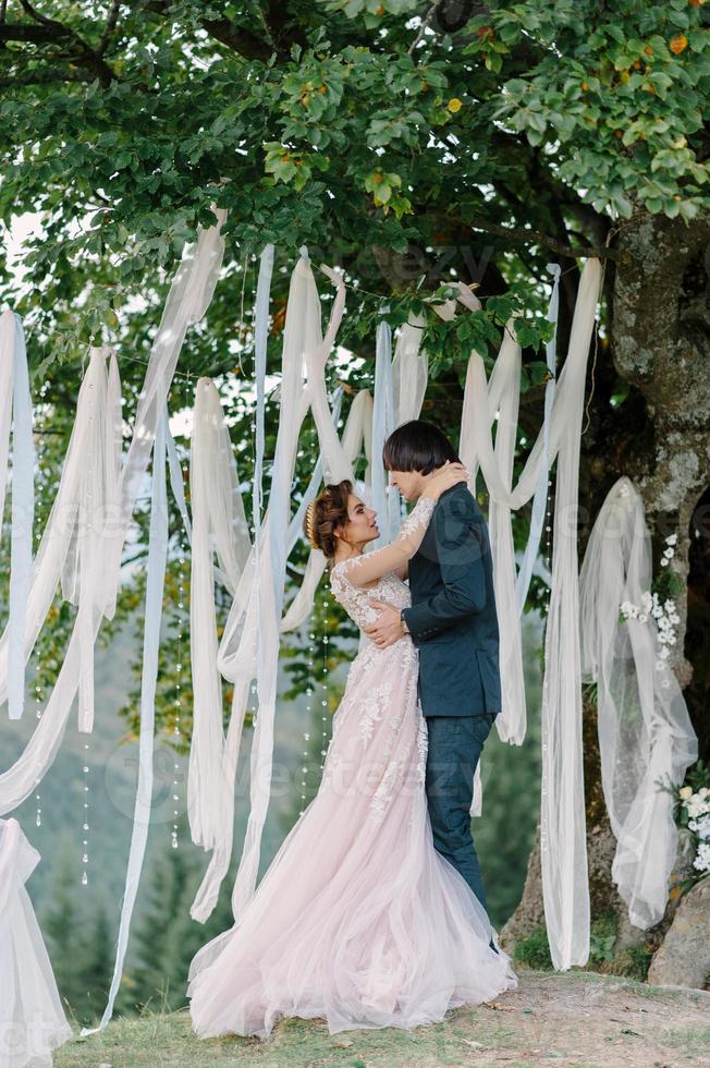 wedding photography in the Carpathians. Wedding ceremony in the forest photo