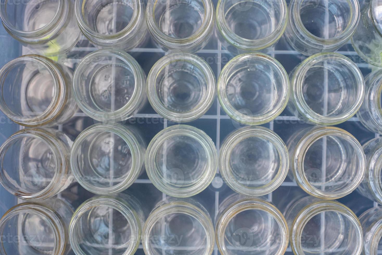 Sorting and collection of glass containers for recycling and reuse. photo