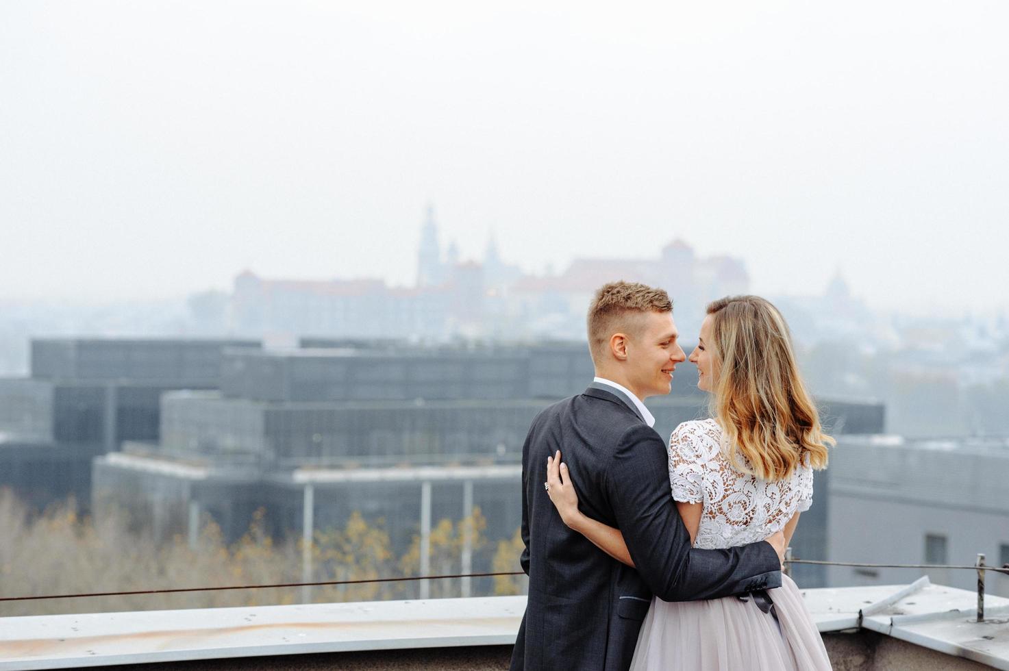 Two lovers walk along Krakow photo