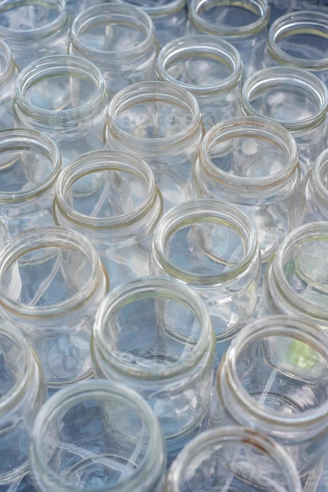 Sorting and collection of glass containers for recycling and reuse. photo
