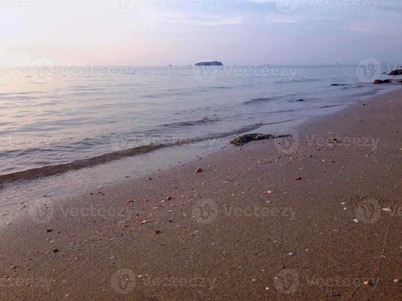 Beach sea water in the evening photo