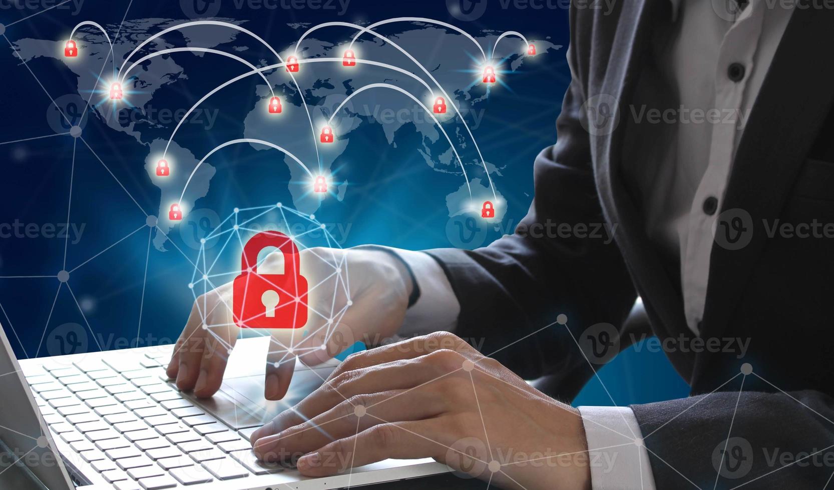 Businessman use Laptop with World map on a technology background, glowing lines connected, Cyber Security Data Protection Business Technology Privacy concept, Internet Concept of global business photo