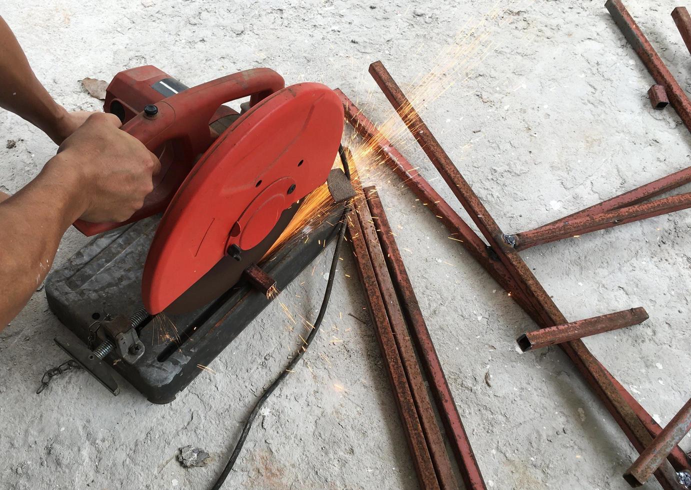 Man using steel cutters work photo