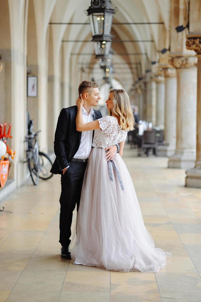 Two lovers walk along Krakow photo