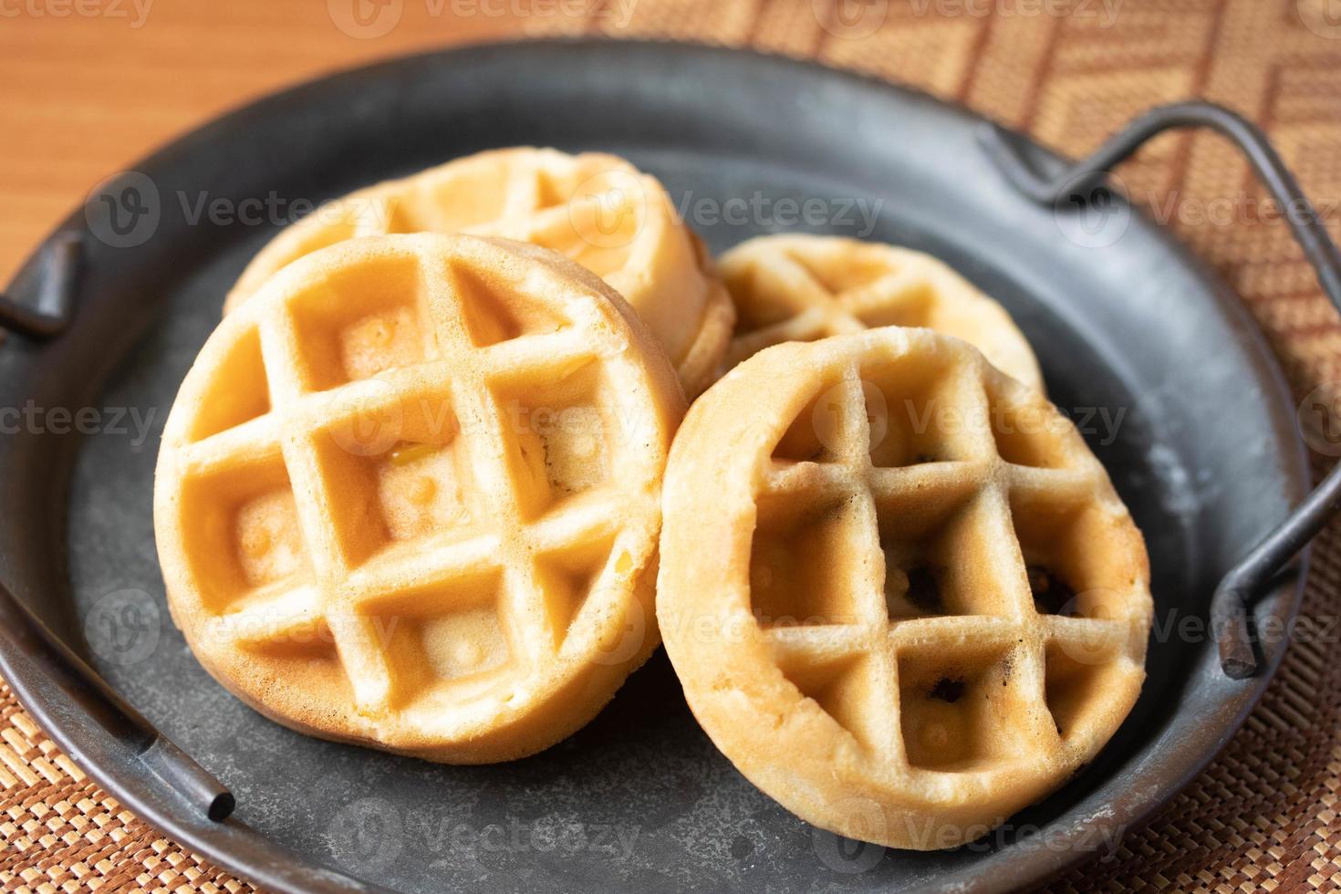 Breakfast vanilla waffles on a tray photo