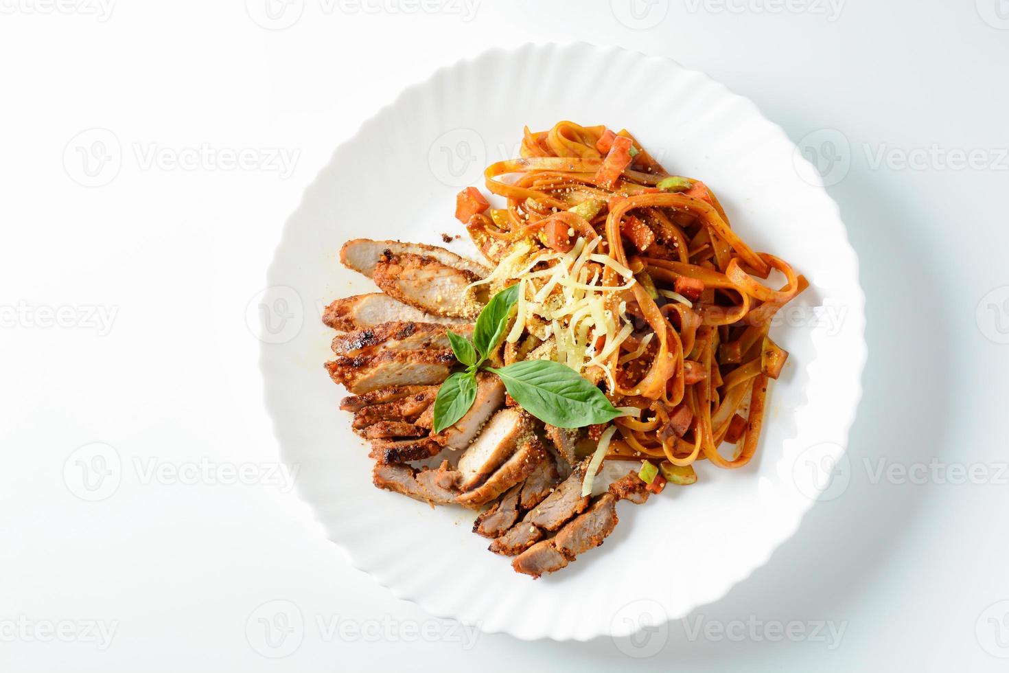 Steak meat with spaghetti and cheese on white background. photo