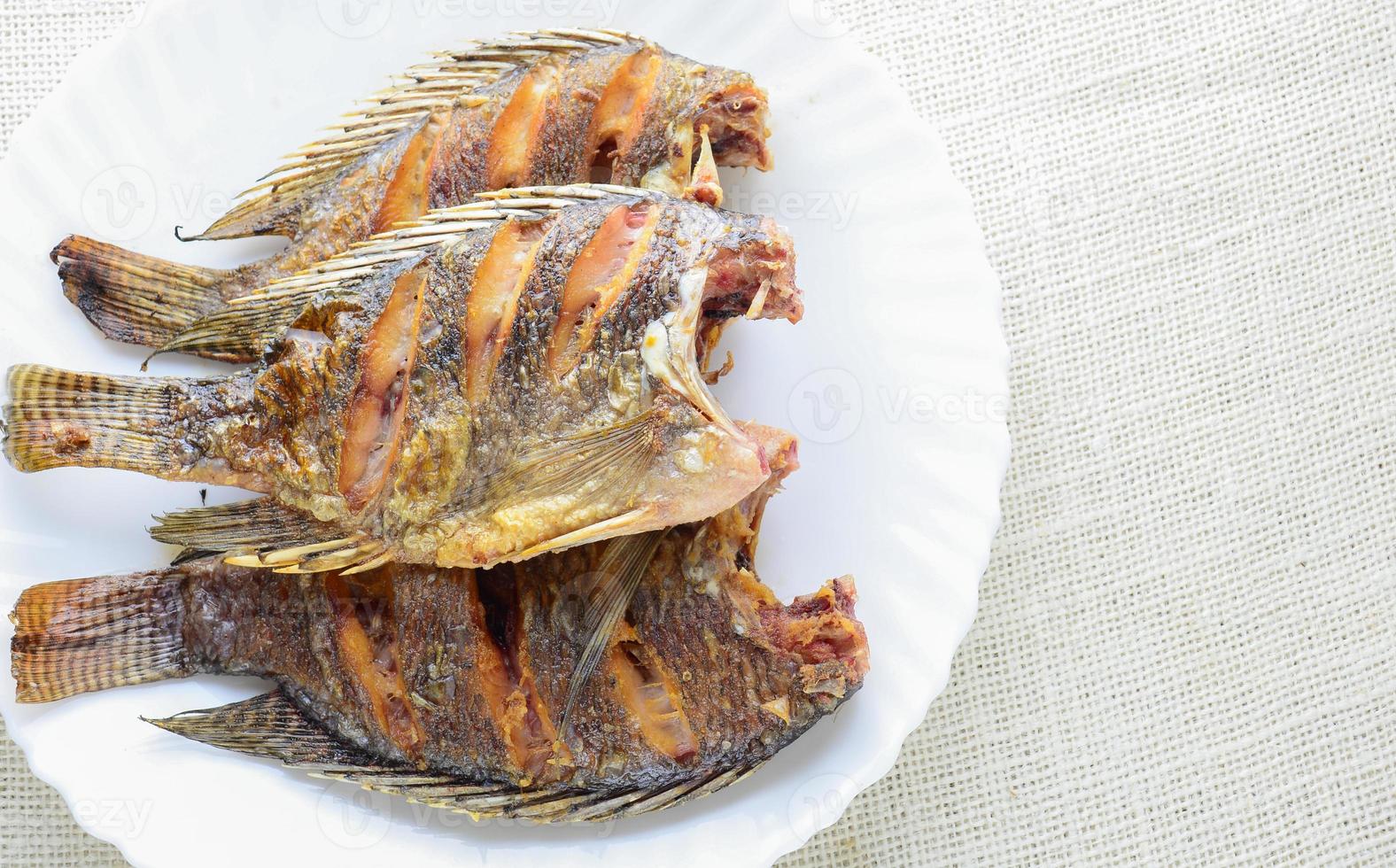 Deep Fried Tilapia Fish with Fish Sauce and Pepper photo