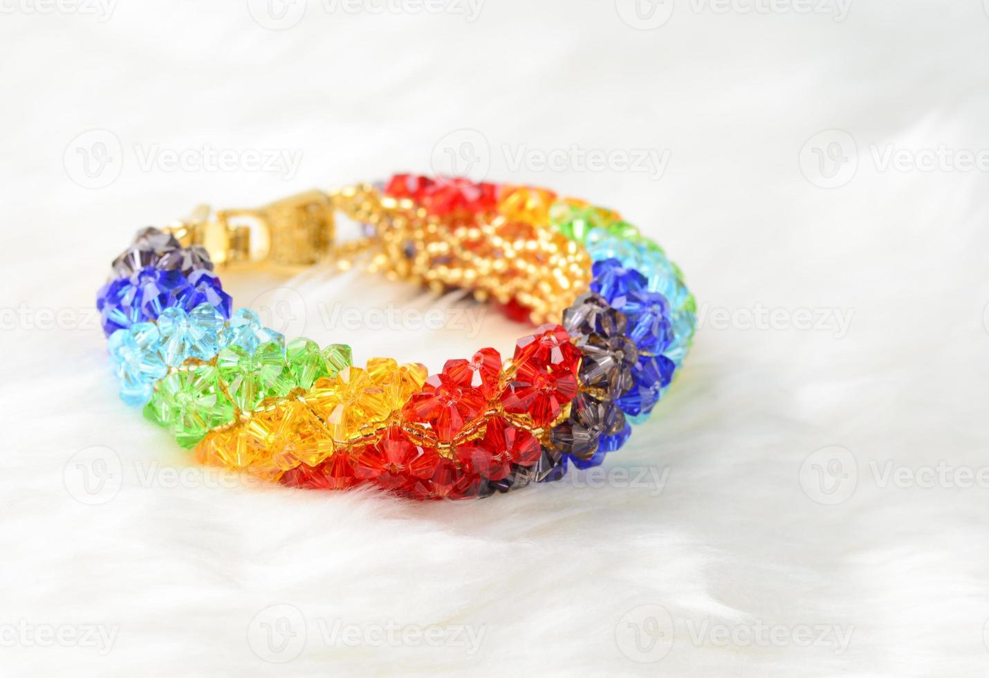 Bracelet with crystal on white background photo