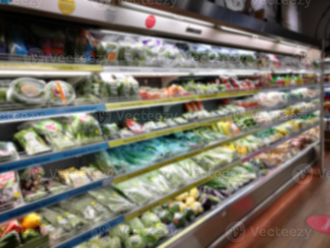 Blurred of product shelves in supermarket or grocery store, use as background photo