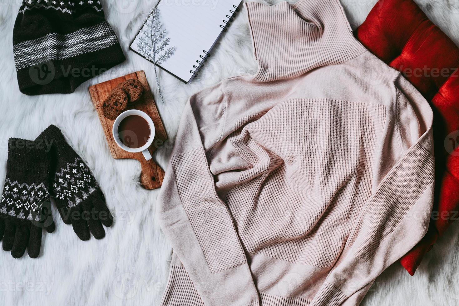 Creative flat lay composition for winter fashion background photo