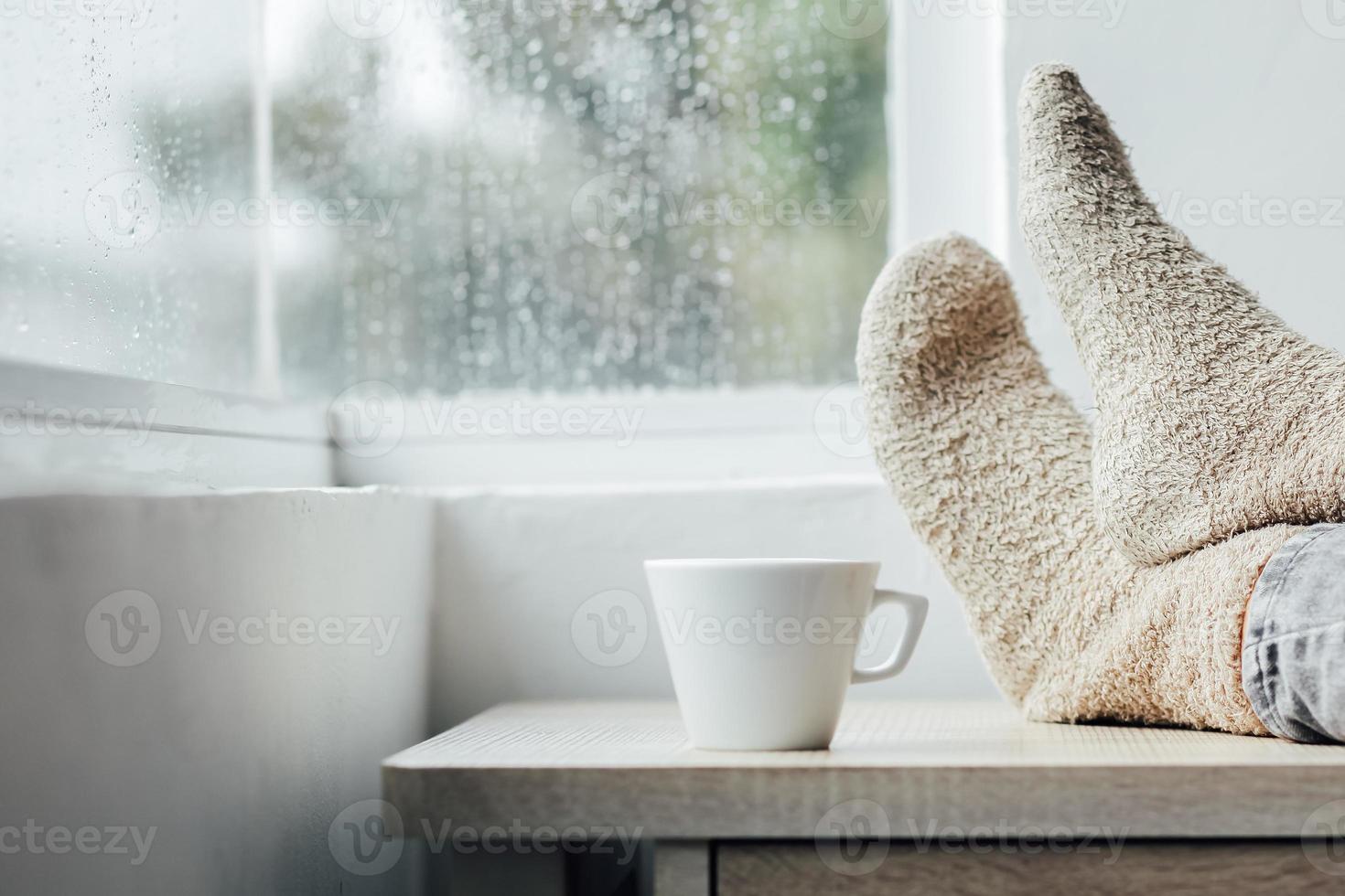 Foot with shocks chilling on winter photo