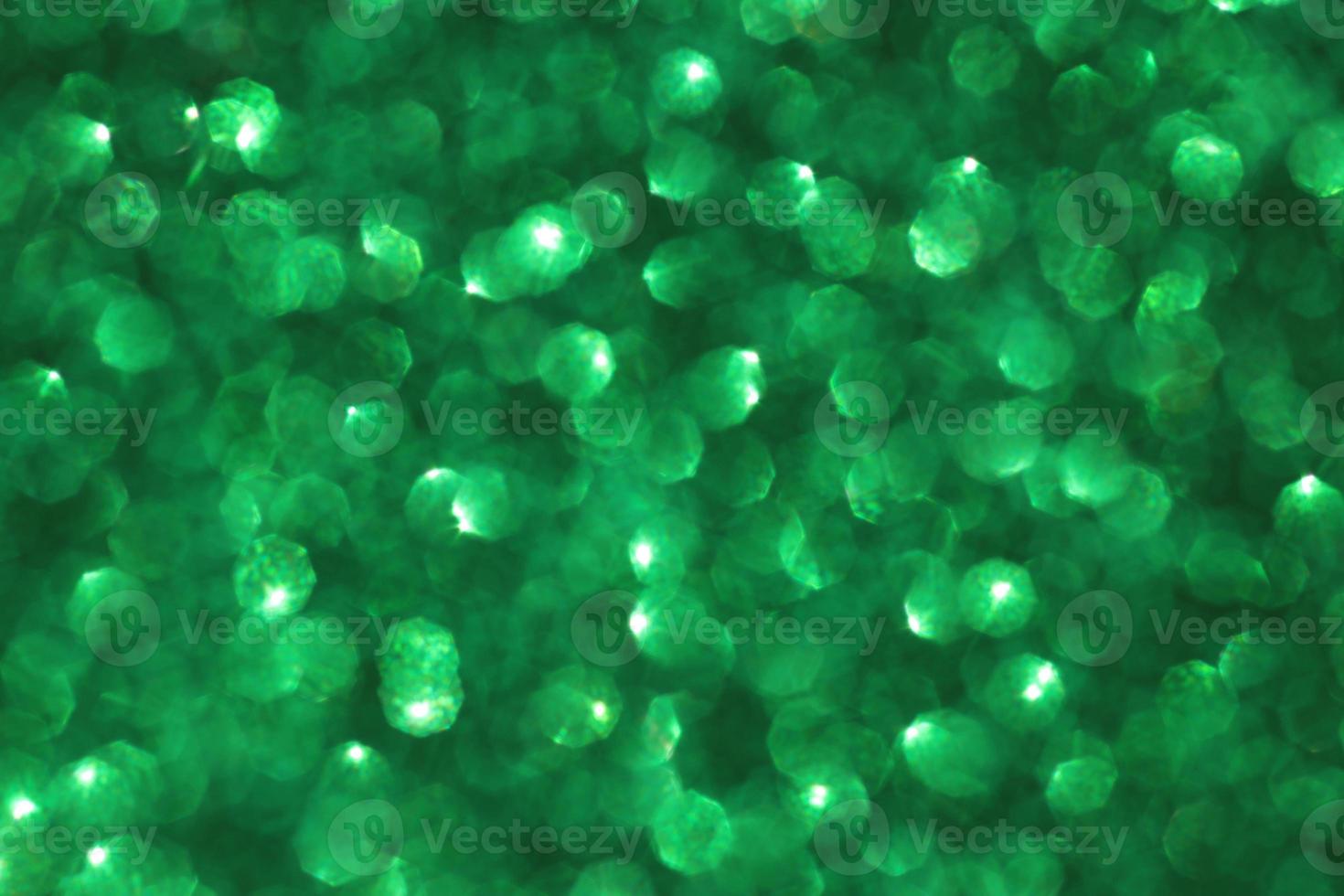 Green sparkle blurry background with sparkling and blurred texture photo