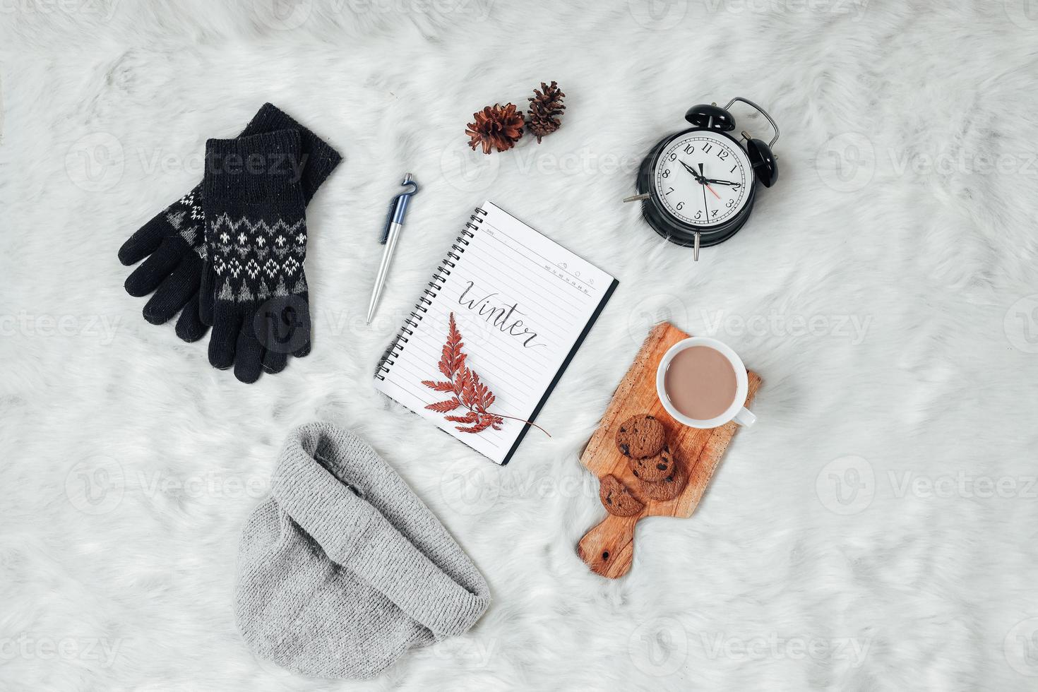 Flat lay with creative composition of winter  accessories background photo