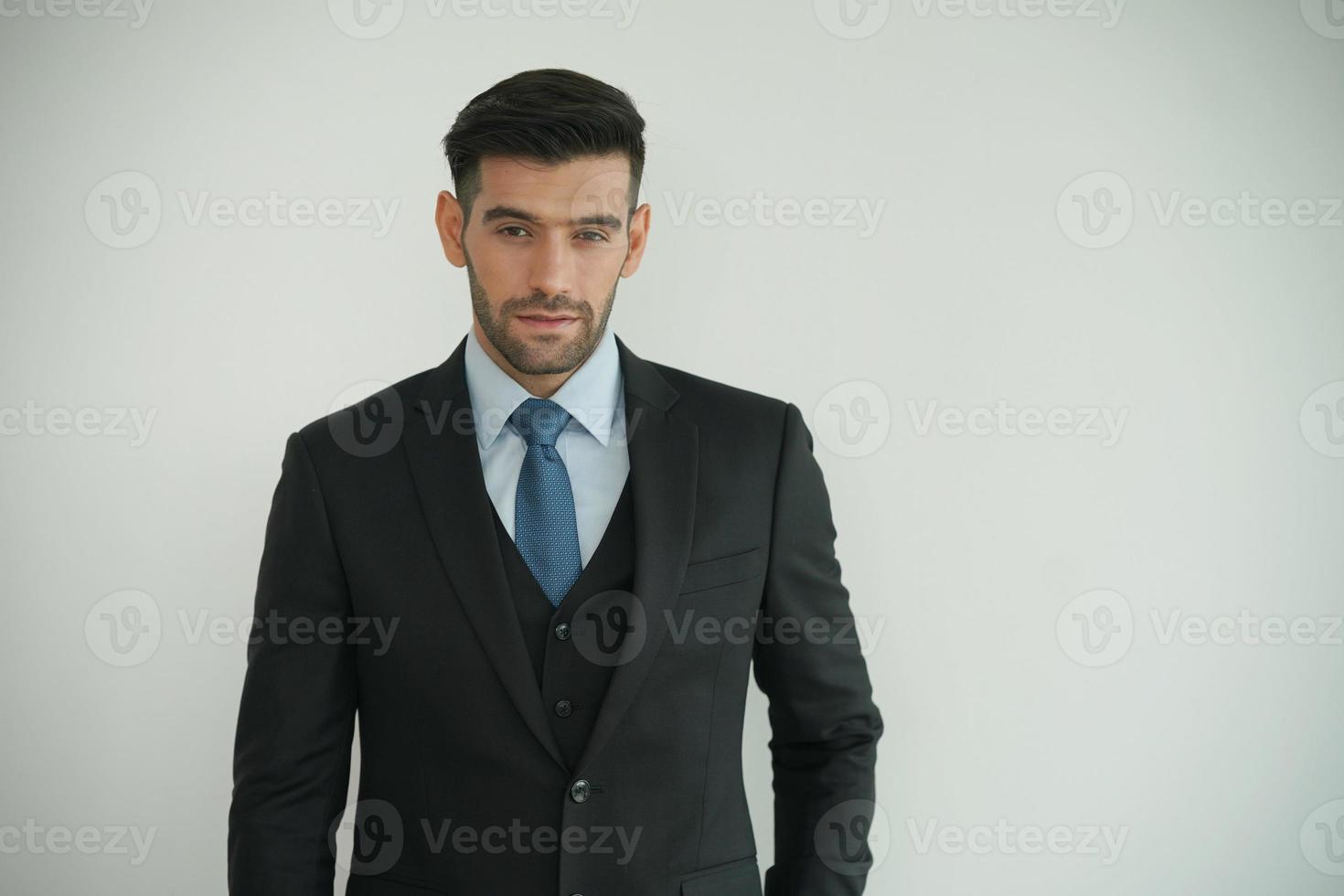 Elegant young caucasian handsome man on White background, Studio fashion portrait. photo