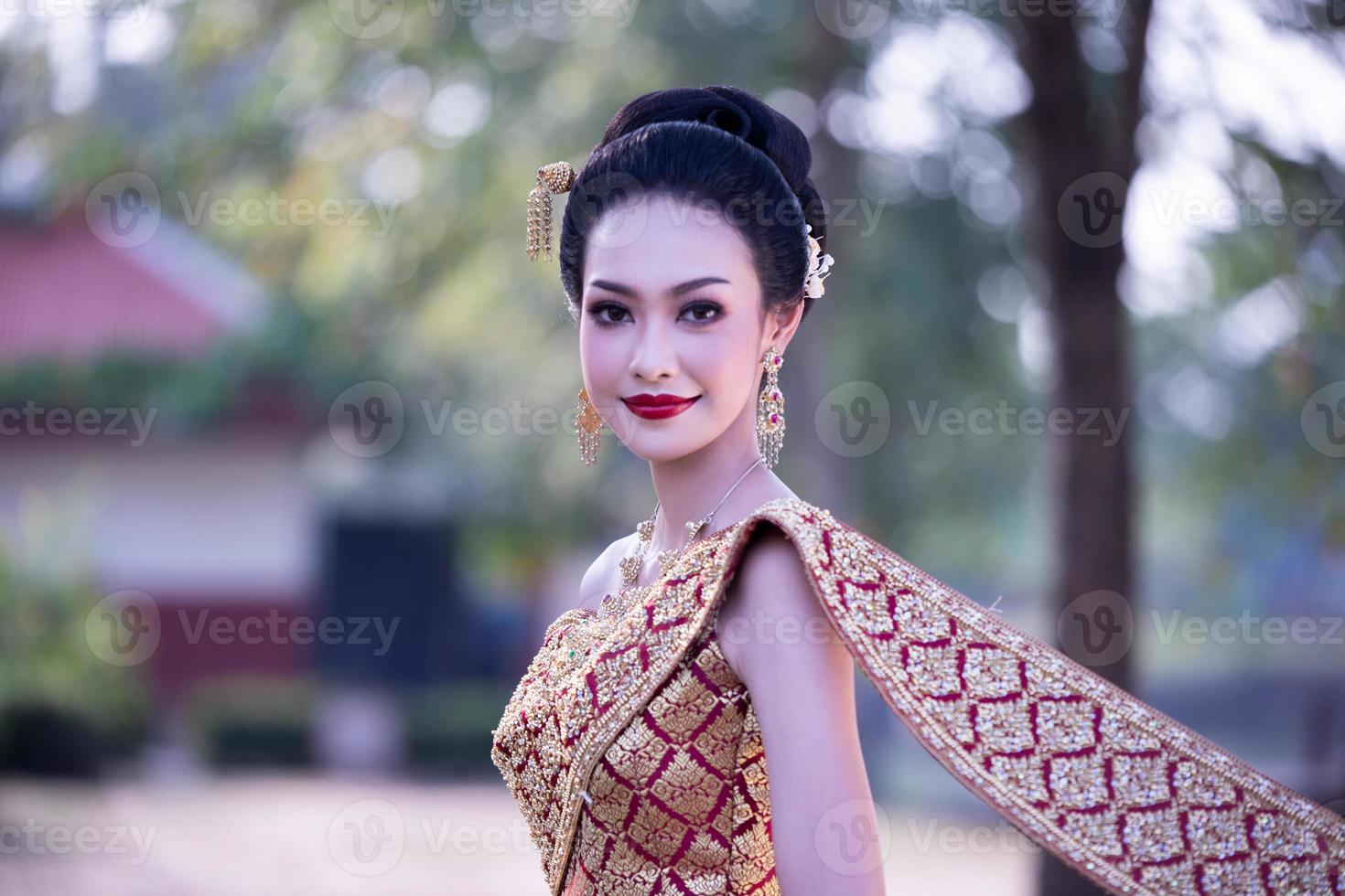 Asia woman wearing traditional Thai dress,The costume of the national dress of ancient Thailand. photo