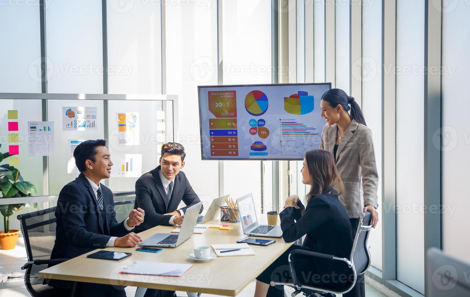 Young start-up business team working in meeting room. photo