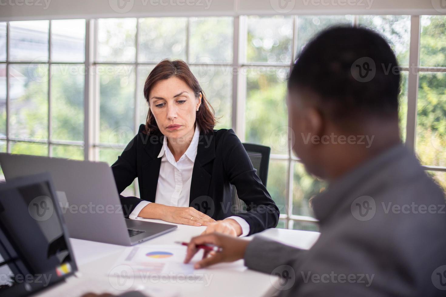 Group of business people discussing and giving ideas photo