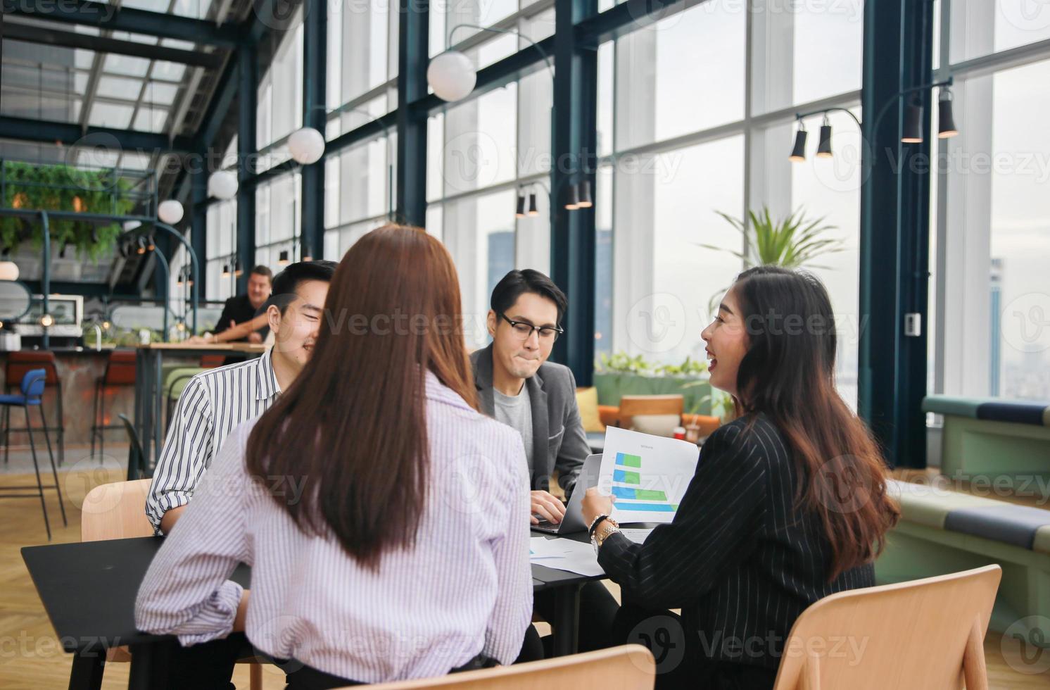 business people brainstorming and discussing business plan on meeting photo