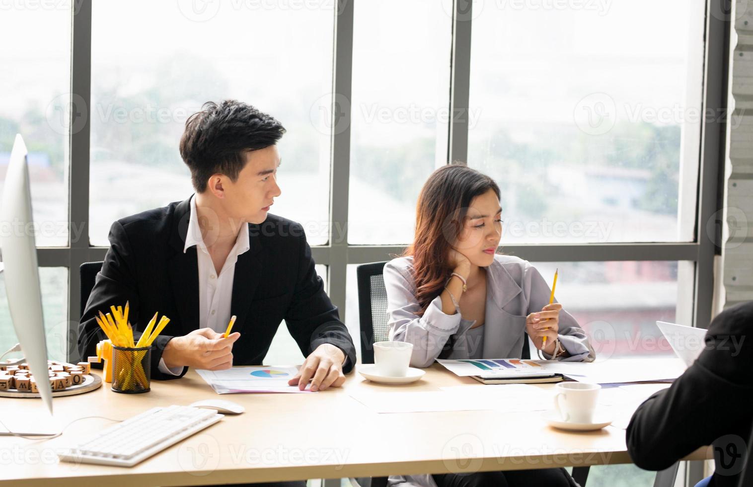 Group of business people collaborating in office or Multiethnic business people in meeting. photo