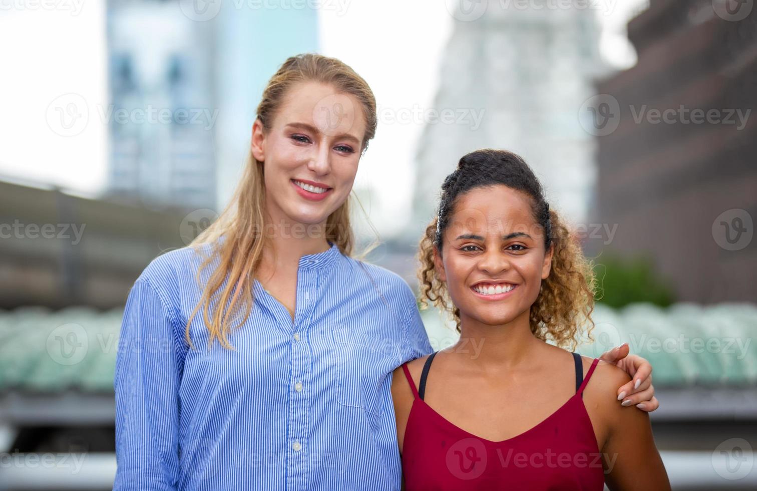 Business woman discussing with colleague at outdoor. photo