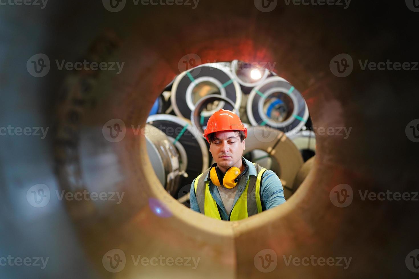 Industry worker Foreman or worker work at factory site check up machine or products in site. Engineer or Technician checking Material or Machine on Plant. Industrial and Factory. photo