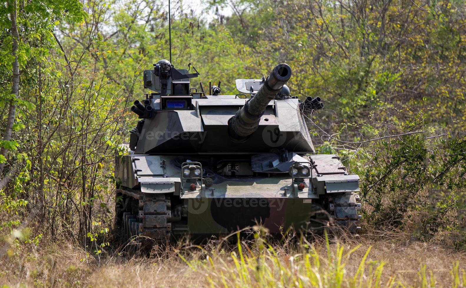 Ammo Military tank in the forest. photo