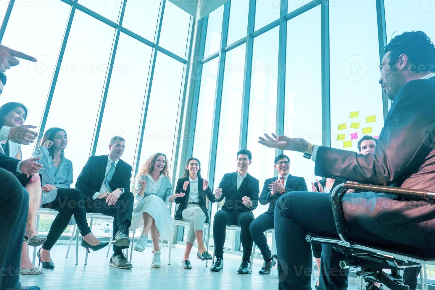 Group of business people collaborating in office or Multiethnic business people in meeting. photo