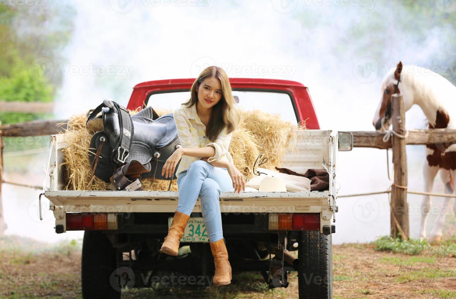 Young woman with her horse in evening sunset light. Outdoor photography with fashion model girl. Lifestyle mood photo