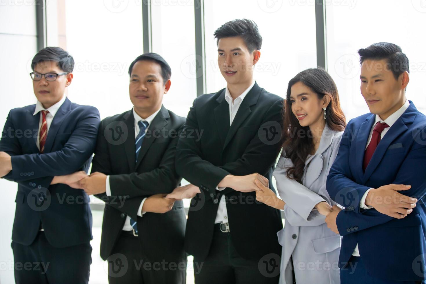 Young start-up business team working in meeting room photo