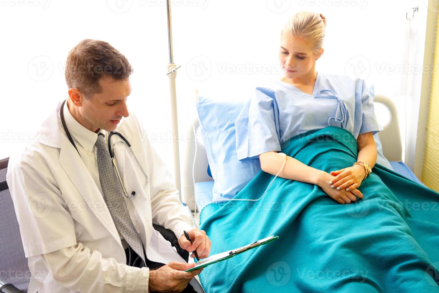 Doctor and patient in hospital photo