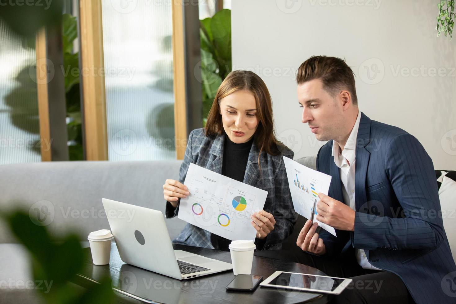 Two of business people discussing and collaborating in office or Multiethnic business people in meeting. photo