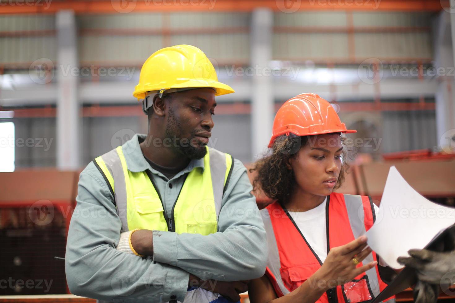 Industry worker Foreman or worker work at factory site check up machine or products in site. Engineer or Technician checking Material or Machine on Plant. Industrial and Factory. photo