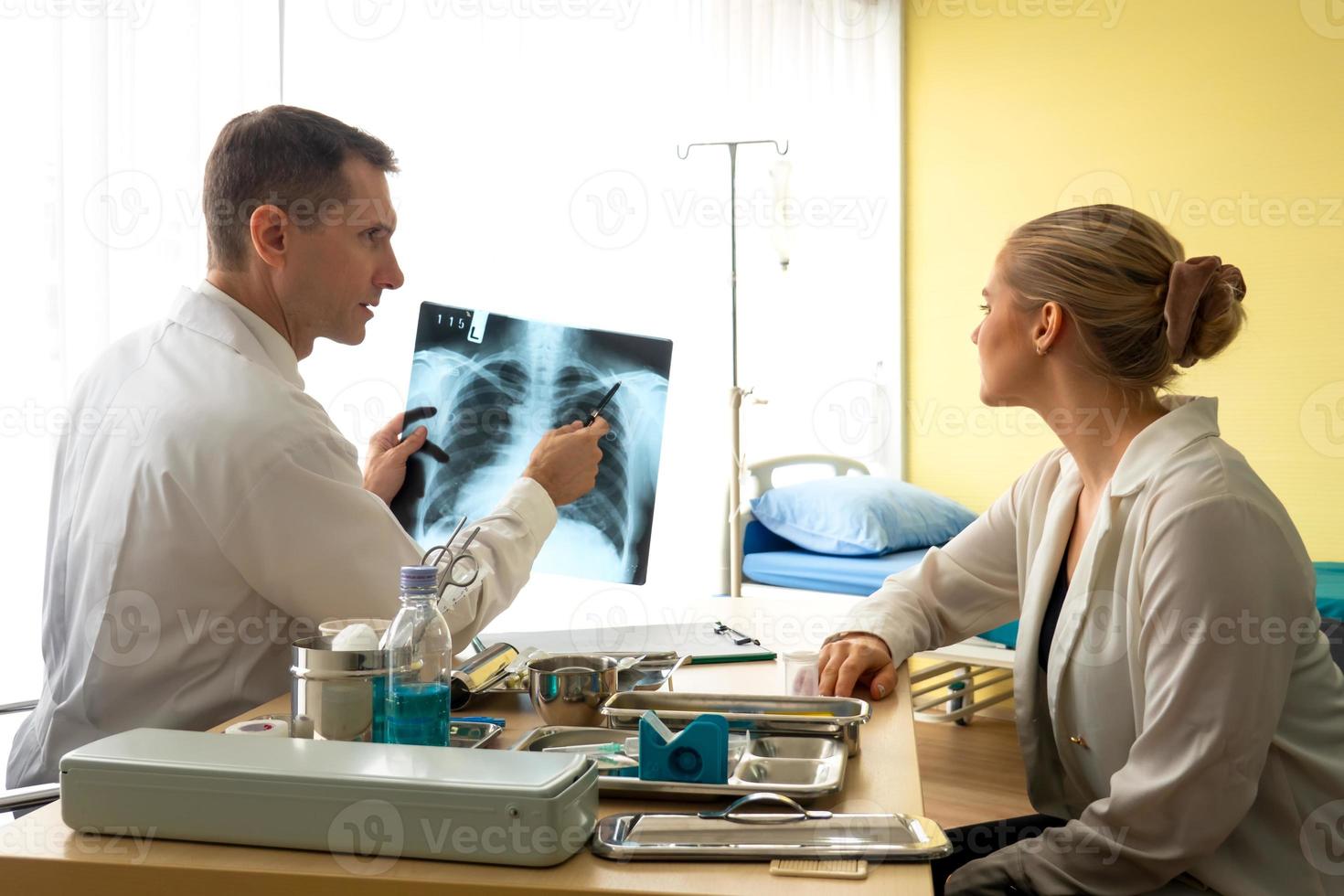 Doctor and patient in hospital photo