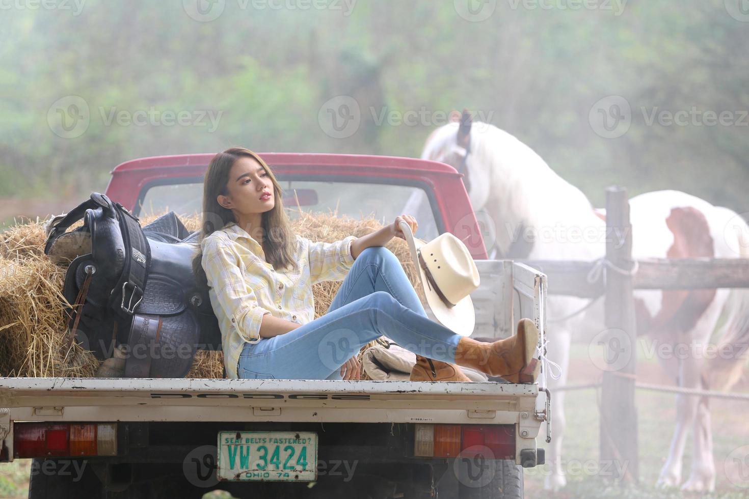 Young woman with her horse in evening sunset light. Outdoor photography with fashion model girl. Lifestyle mood photo