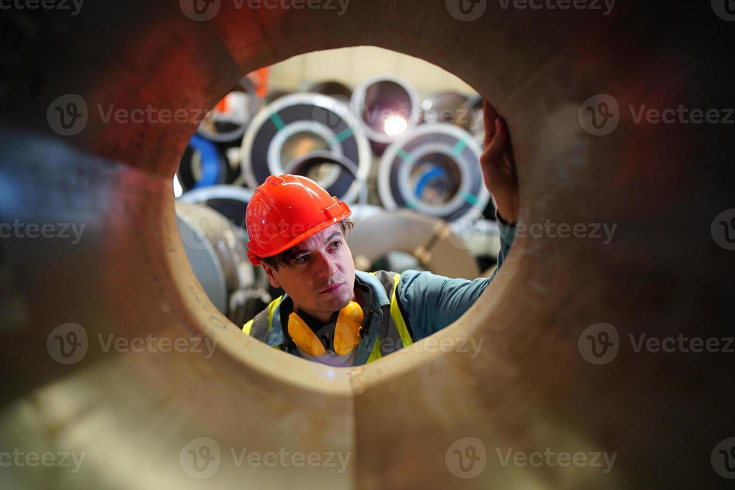 Industry worker Foreman or worker work at factory site check up machine or products in site. Engineer or Technician checking Material or Machine on Plant. Industrial and Factory. photo