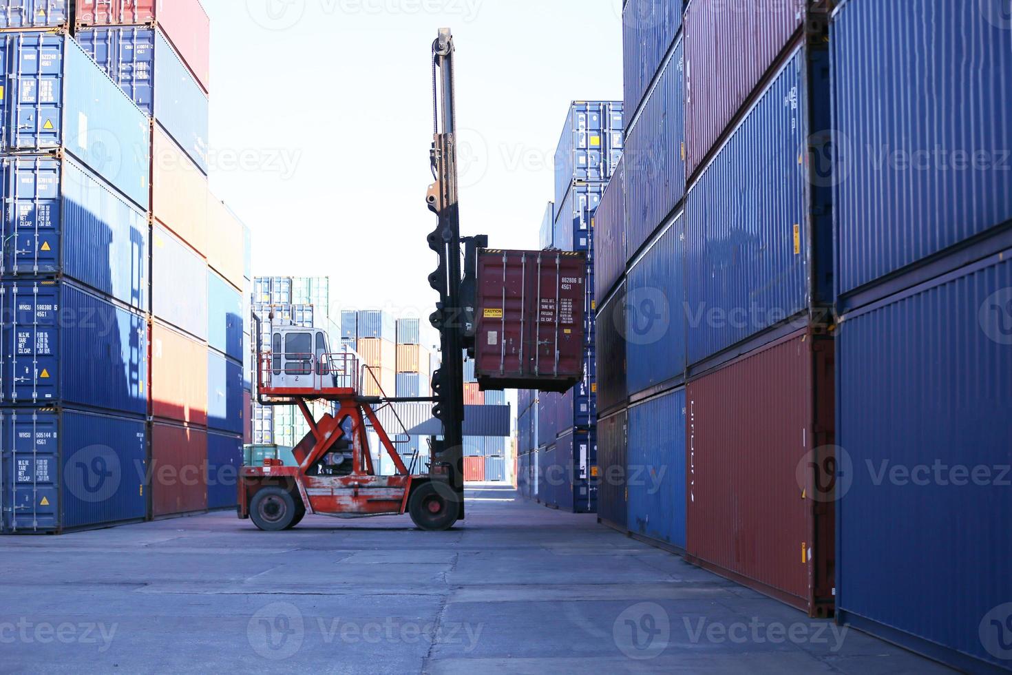 Containers box from Cargo freight ship for import export. photo