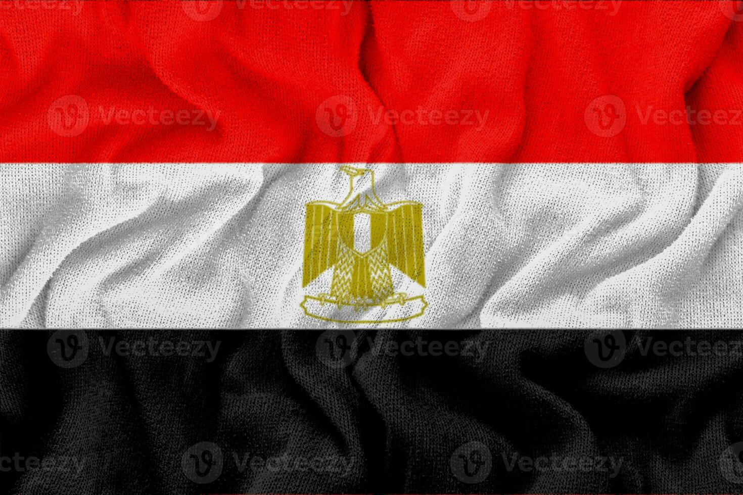 Fabric wavy texture national flag of egypt. photo