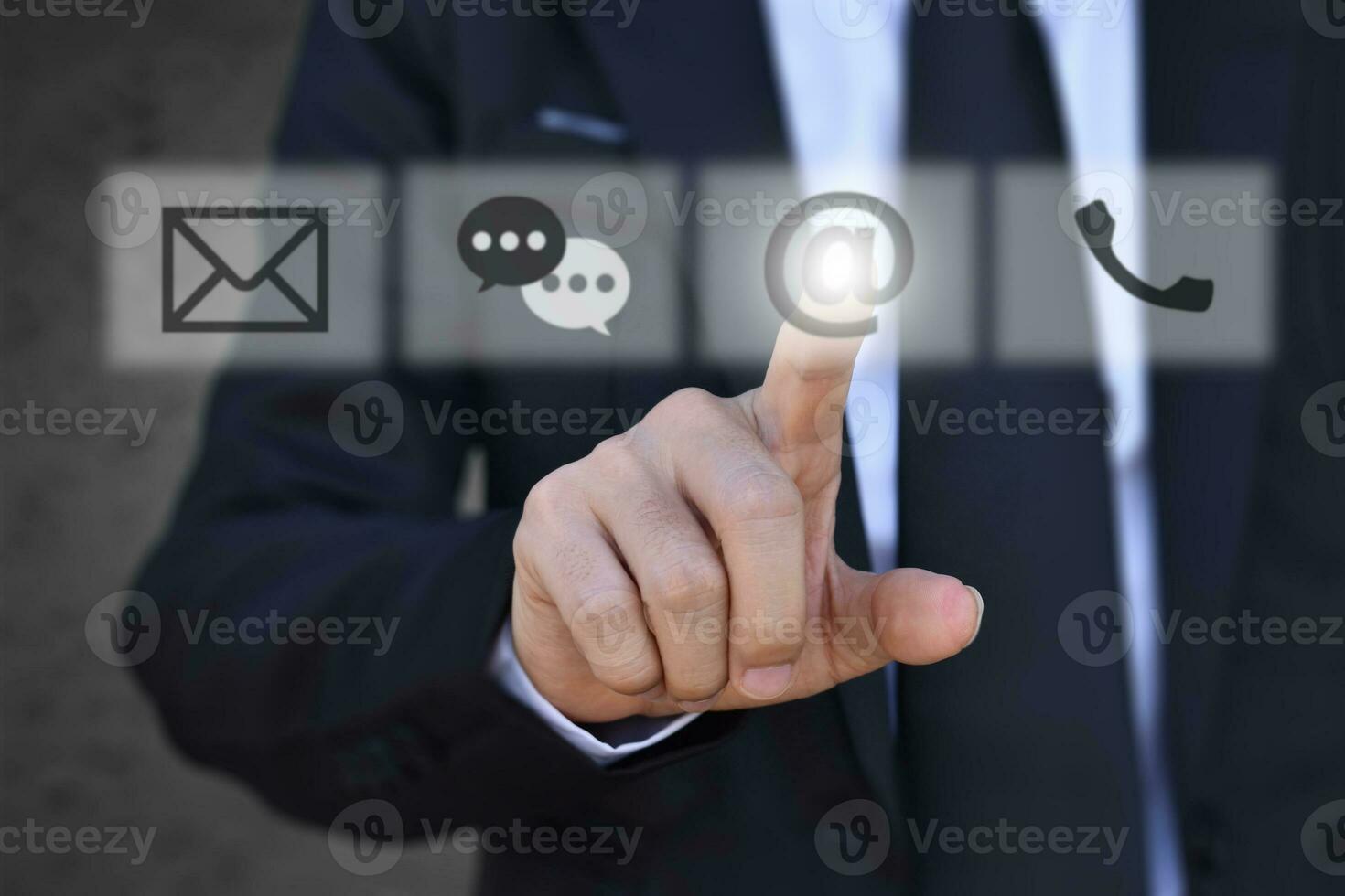 Businessman pressing with button icon message, email address and call. Concept of customer service call center contact us. photo