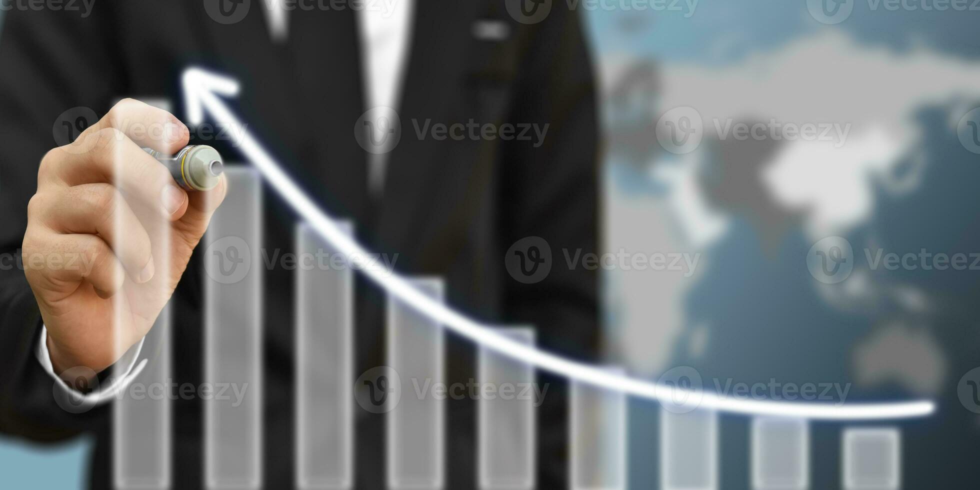 Businessman drawing arrow on screen graph corporate future growth plan. Concept of business development and growth. Elements of this image furnished by NASA photo