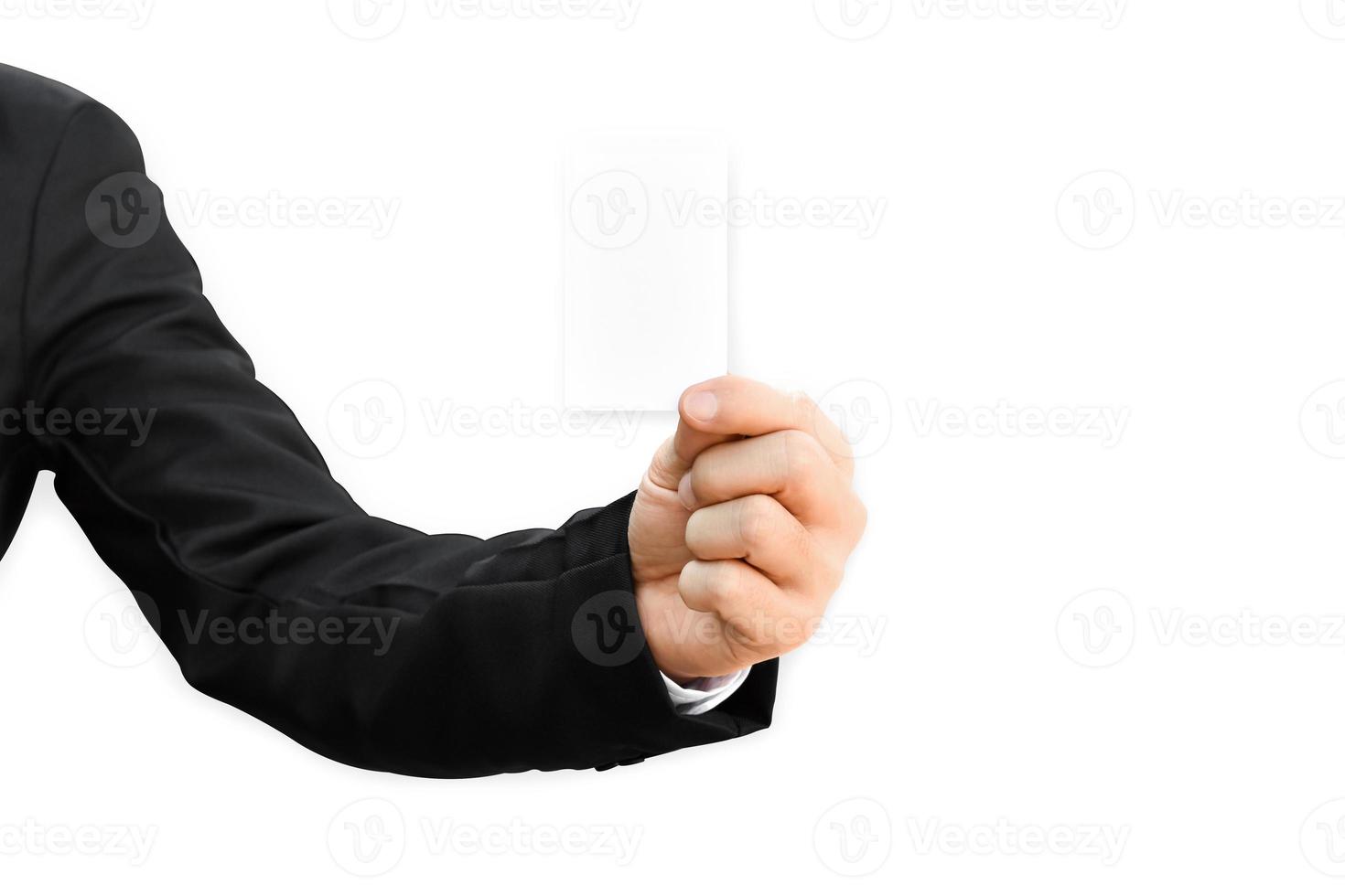 Man's hand in suit holding white business card isolated on white background, with clipping path. photo