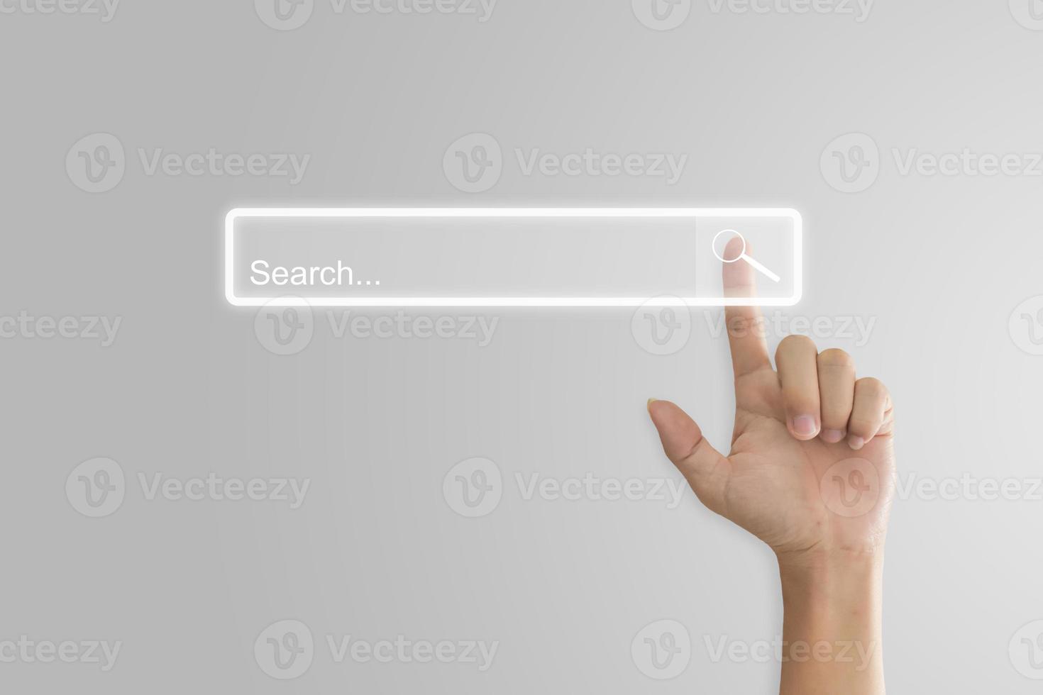 Hand click search button page on virtual screen. Idea for searching browse data information networking. Copy space for text. photo