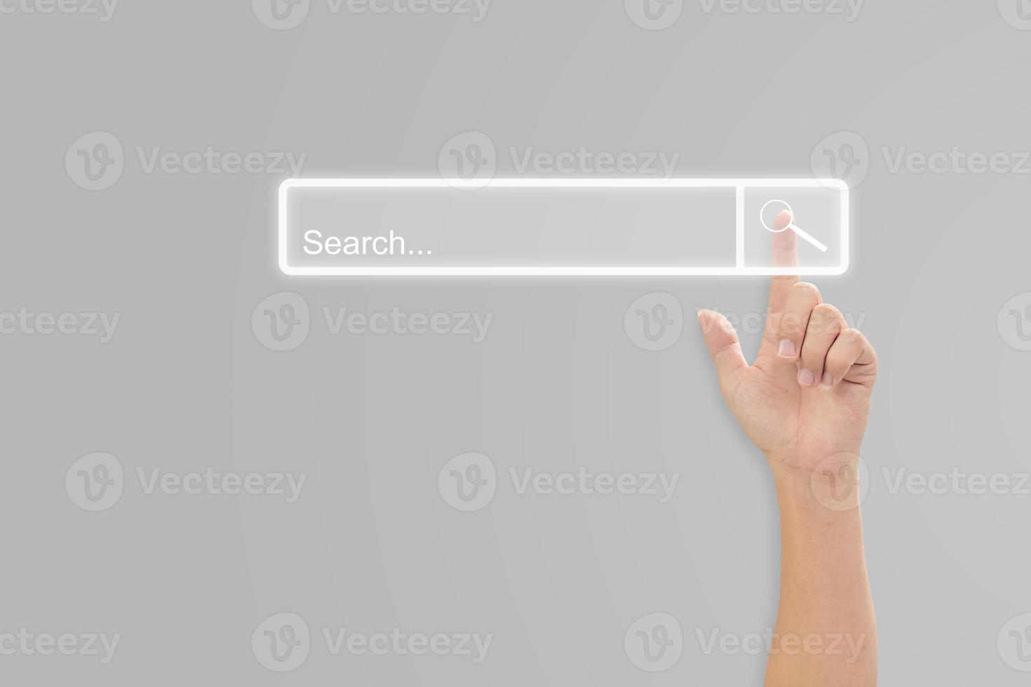 Hand click search button page on virtual screen. Idea for searching browse data information networking. Copy space for text. photo