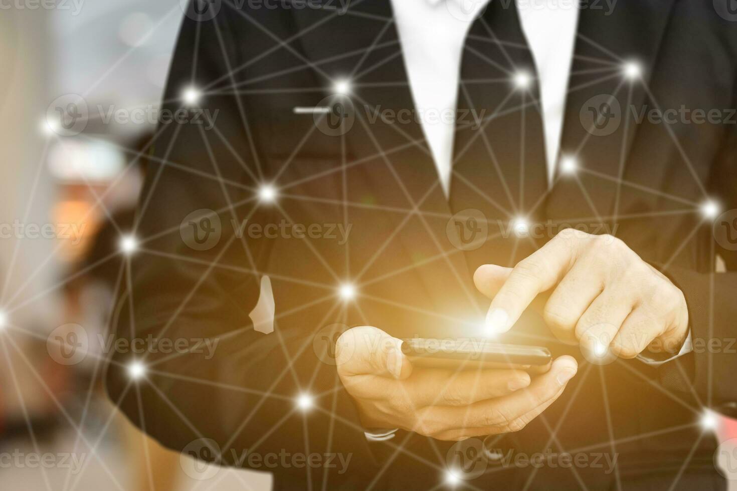 Close up of Businessman using smartphone with icon network. Man hand holding mobile phone for technology or internet banking concept. photo