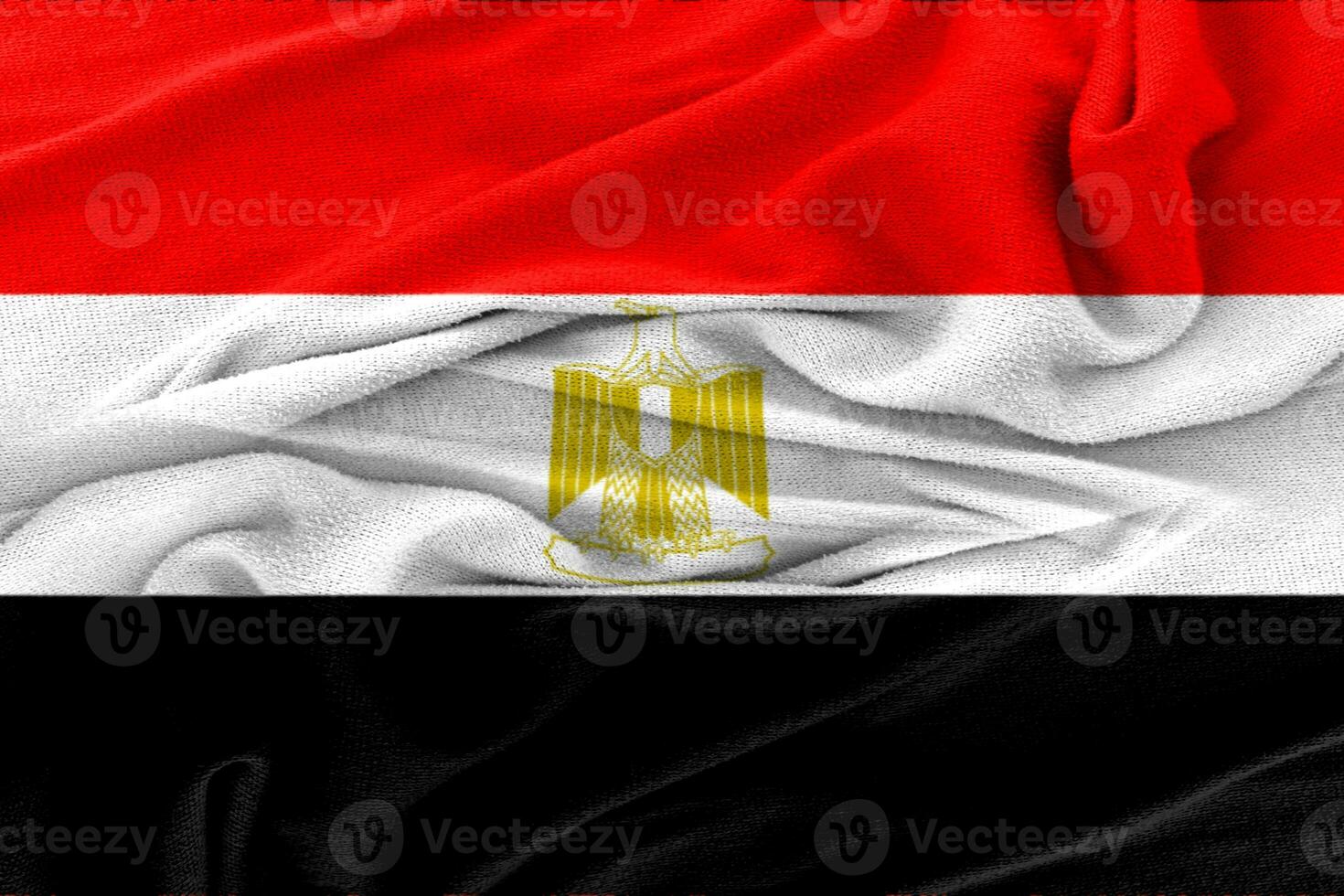 Fabric wavy texture national flag of egypt. photo
