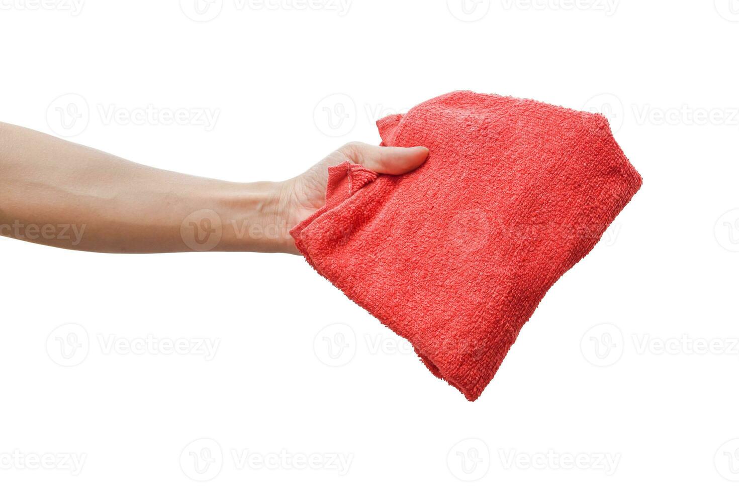 Male hand holding red cloth isolated on white background with clipping path. photo