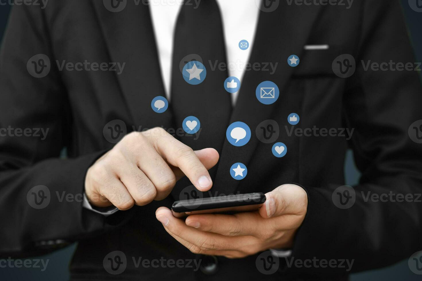 Close-up of businessman hands using mobile smartphone with social media icon. Idea for business, online marketing and technology. photo