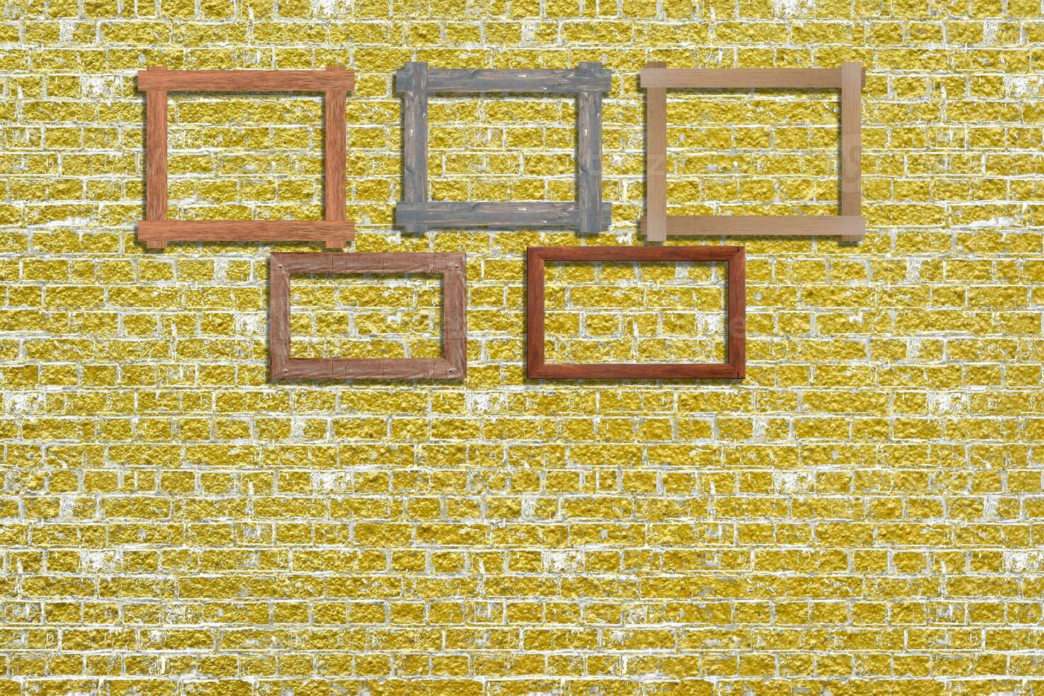 Vintage photo frames on golden brick wall for interior or background.