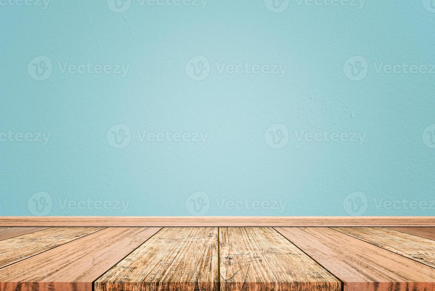 Empty interior room with light blue cement wall texture and brown wooden floor pattern. Concept interior vintage style photo